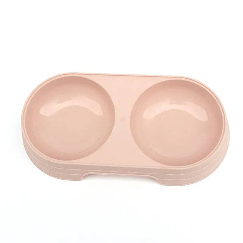 The pink double pet bowl set shown on its own from above