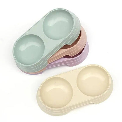 Double pet bowl sets stacked to show the full color range, with the cream one set apart
