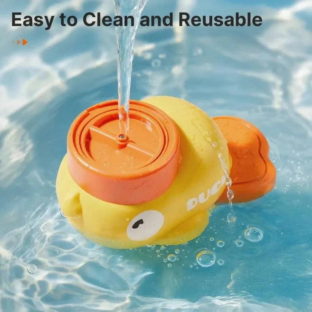 The Noblias duck treat dispenser being rinsed under running water, showing it comes apart to clean.