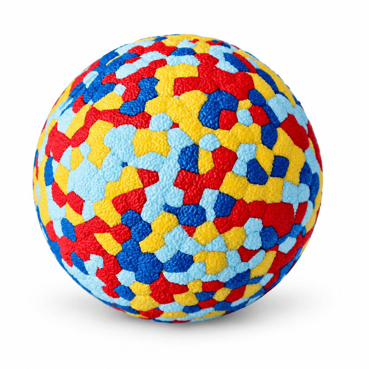 Multicolour durable dog chew ball with red, yellow, blue and light blue patches on a white background.
