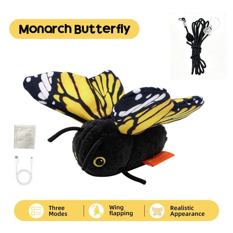 Yellow monarch flapping butterfly cat toy with its hanging cord, USB charging cable and spare parts, badged three modes, wing flapping and realistic appearance.