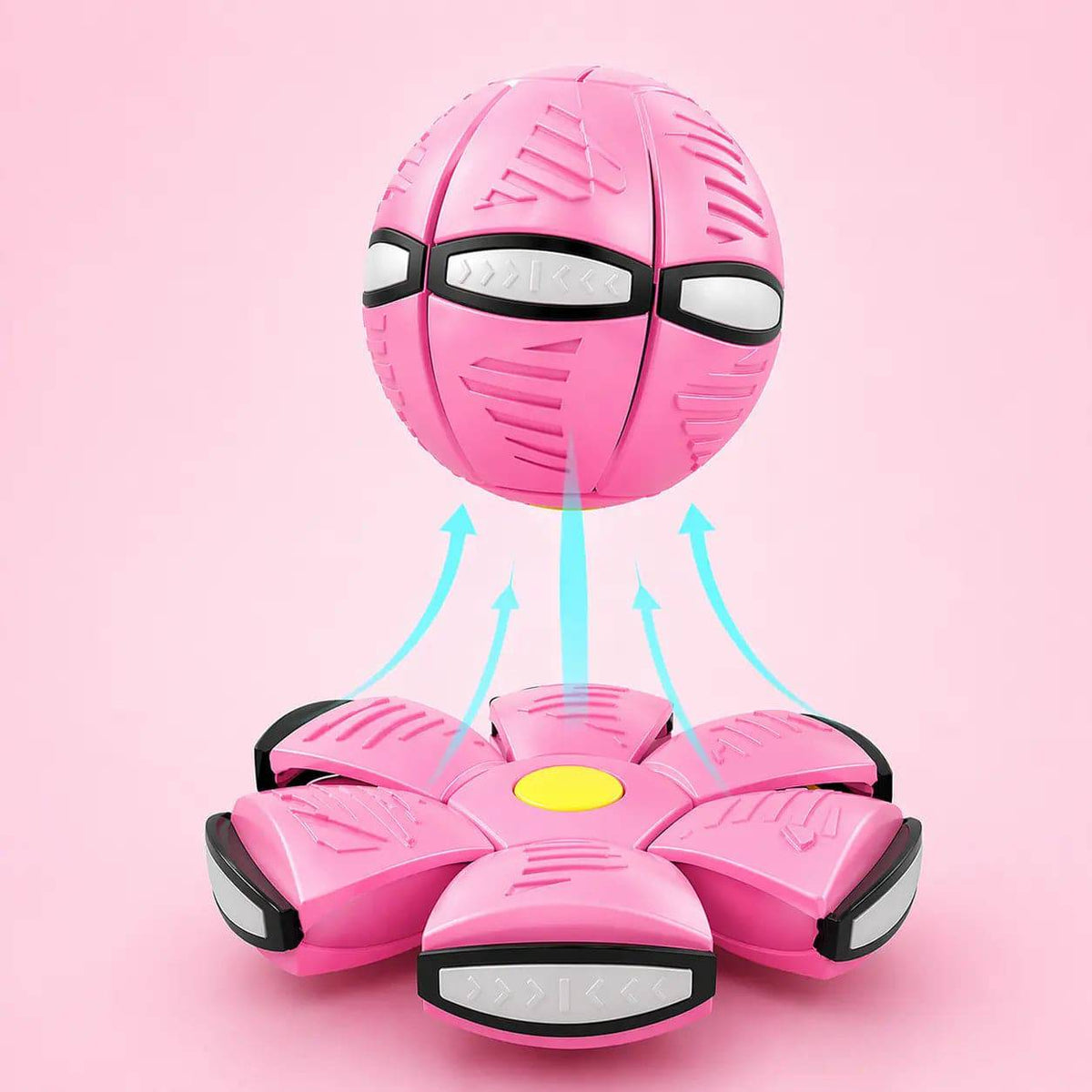 Macaron pink flying saucer ball dog toy shown as a ball above its flattened disc form.