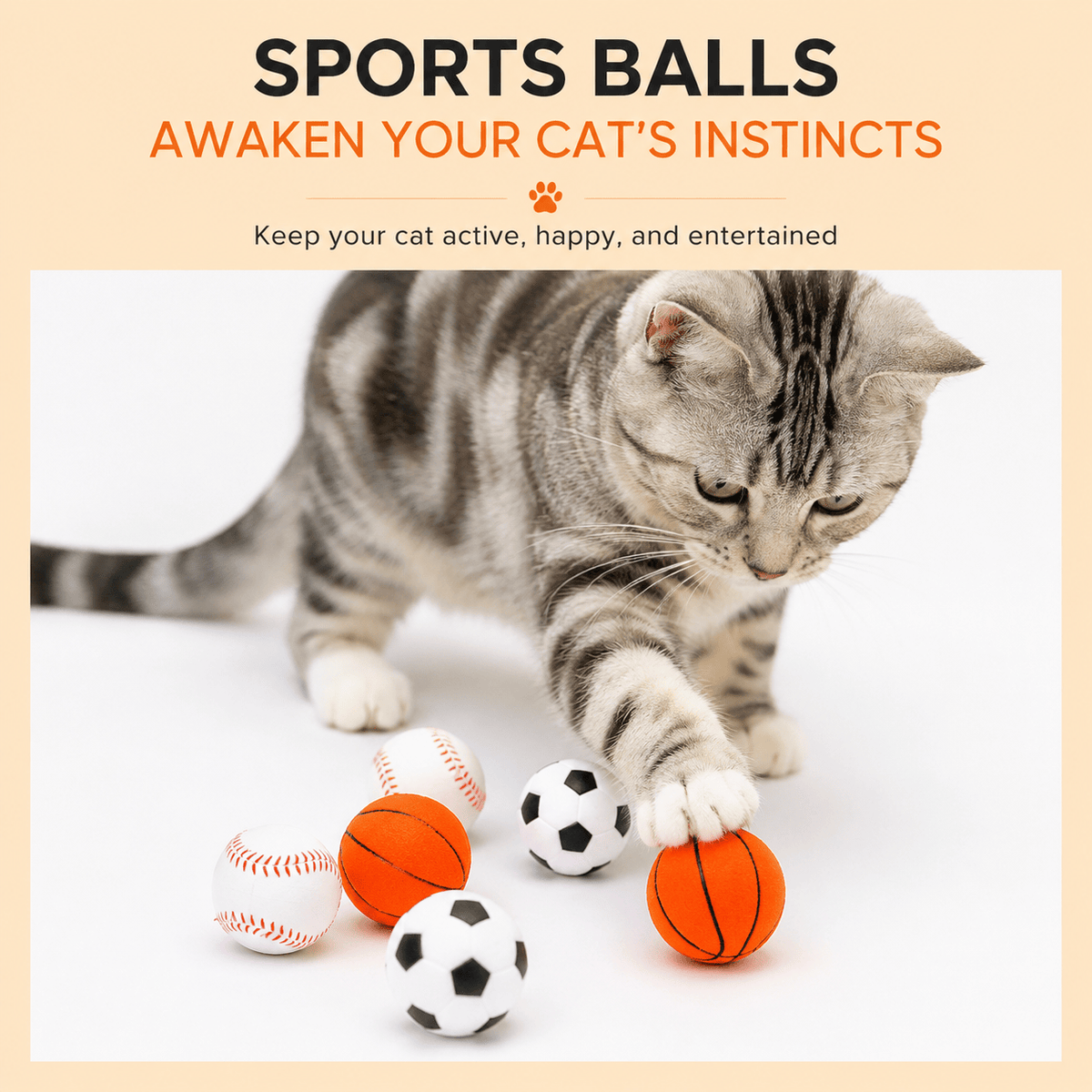 Silver tabby cat batting the soccer ball cat toy on the floor with the baseball and basketball designs nearby.