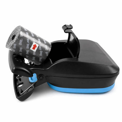 Black and blue foldable pooper scooper lying down with a bag roll coming out of the rear compartment.
