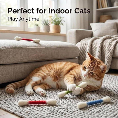 Ginger cat lying on a living room rug with the Q tip toys scattered around, headed perfect for indoor cats
