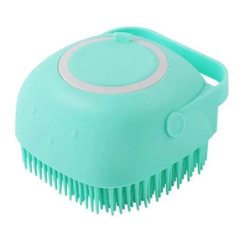Mint green Noblias handheld silicone dog bath brush with its shampoo lid and loop handle.