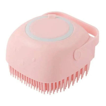 Pink Noblias handheld silicone dog bath brush with its shampoo lid and loop handle.