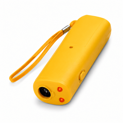 Yellow handheld deterrent with a wrist strap, a lens at the front and two small indicator lights, on a white background.