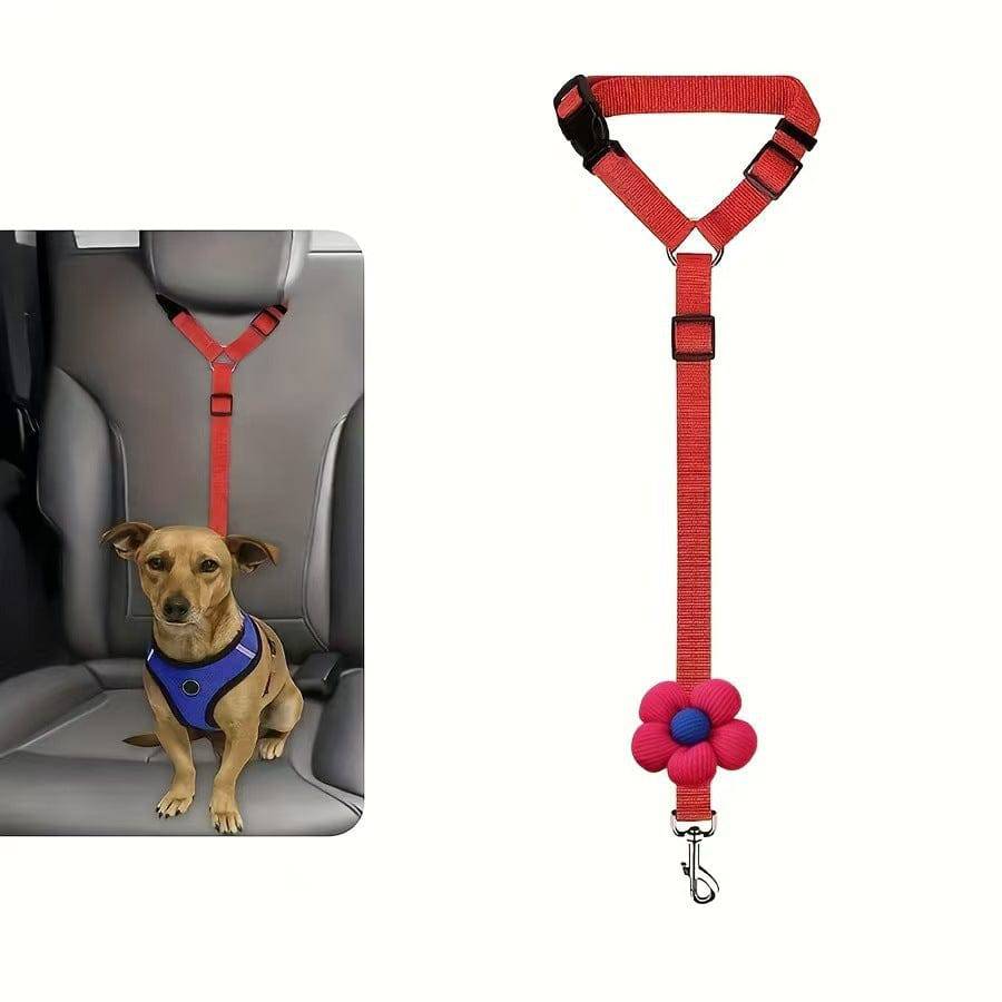 Red headrest dog seat belt on a harnessed dog in the back seat, with the strap shown beside it
