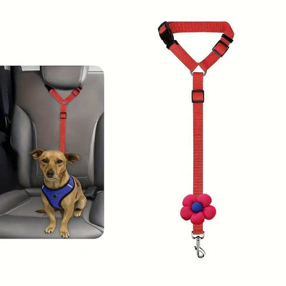 Red headrest dog seat belt on a harnessed dog in the back seat, with the strap shown beside it
