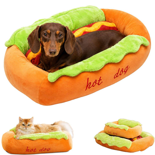 Dachshund curled inside the Noblias hot dog shaped pet bed, with smaller views of a cat in the bed and the bed with its bun lid folded back.