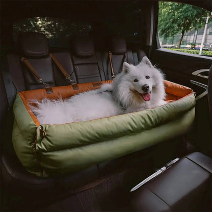 A samoyed sitting in the Noblias large dog car seat bed in an SUV, with the headrest straps visible.