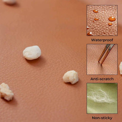 Material panel for the Noblias large dog car seat bed showing water beading off the surface, anti-scratch resistance and non-sticky hair release.