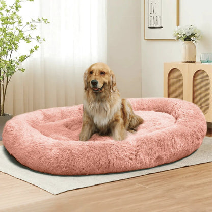 Noblias large plush dog bed shown from above with its deep oval sleeping surface.