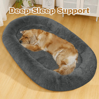 Dark gray Noblias large plush dog bed with a dog sleeping deep inside the raised plush rim.