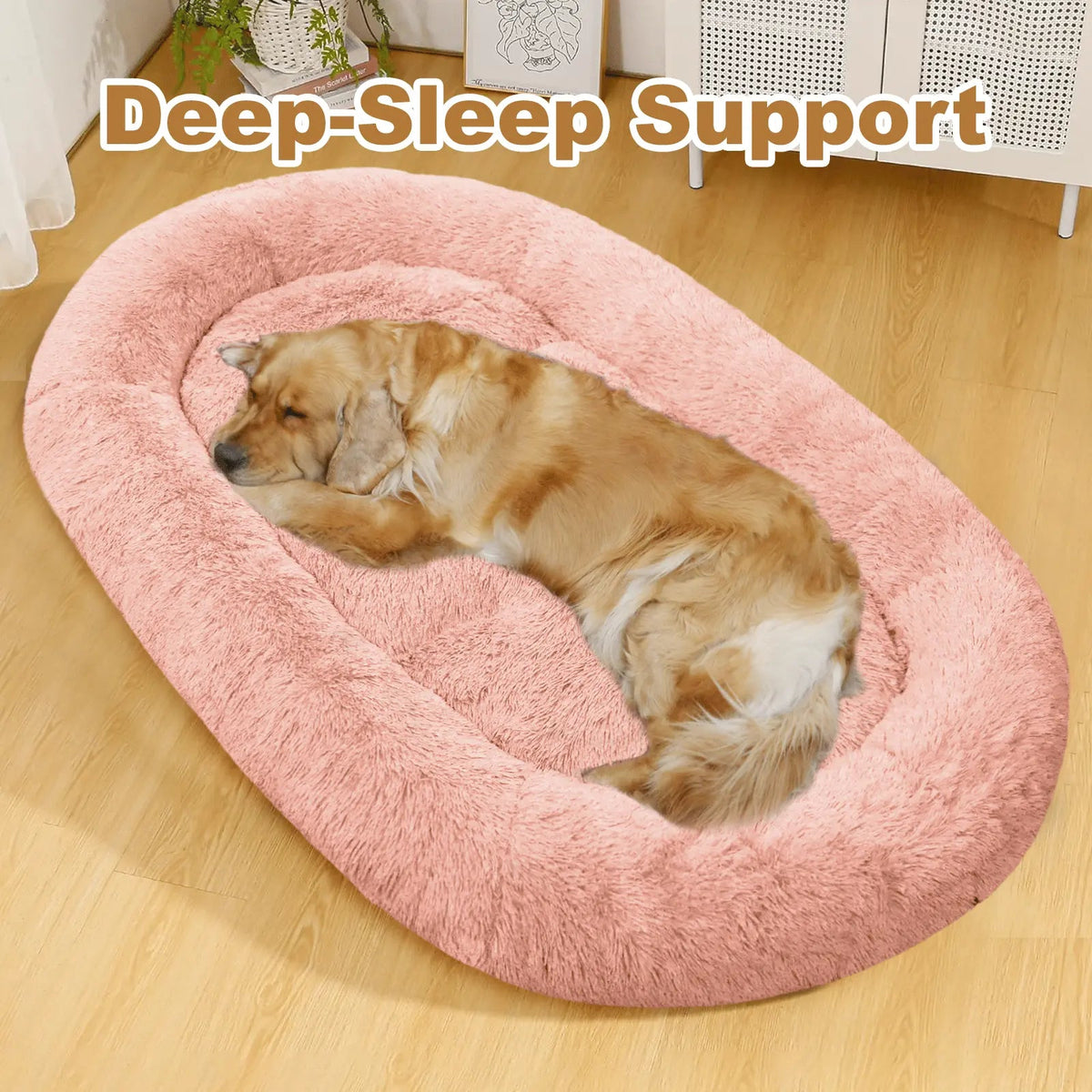 Pink Noblias large plush dog bed with a dog asleep inside the raised rim.