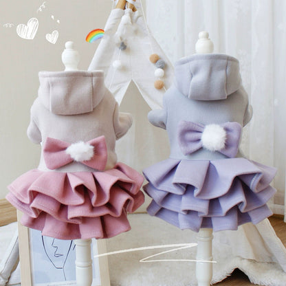 Pink and purple layered dog dresses side by side