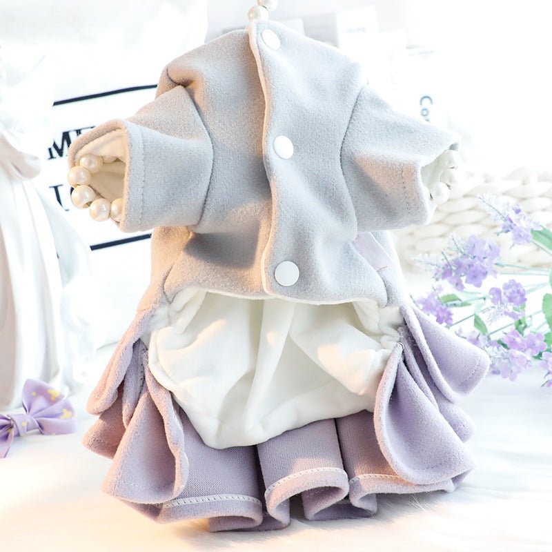 Back of the purple layered dog dress showing the hood and ruffle skirt