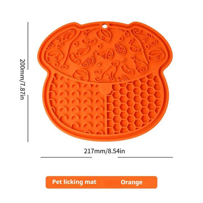 Orange lick mat with dimensions marked 217 mm or 8.54 in wide and 200 mm or 7.87 in tall.
