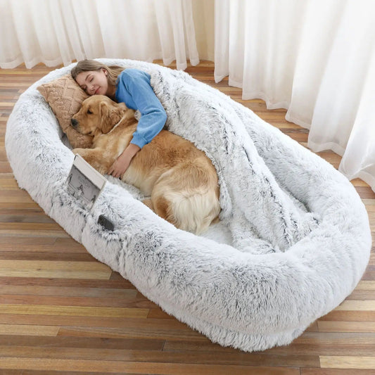 Large light gray orthopedic human dog bed by Noblias, cozy lounger for relaxing and comfort.