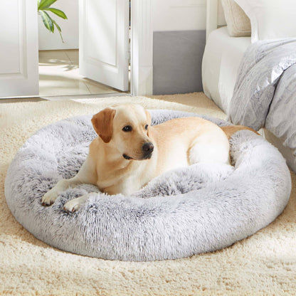 Light gray Noblias Cloud Calming Donut Bed for dogs and cats, cozy round shape with soft plush fabric for comfort.