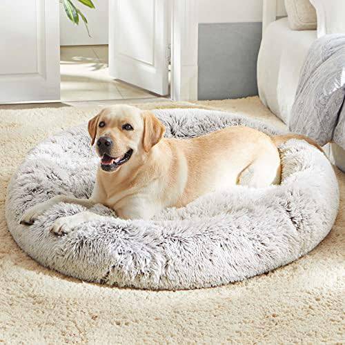 Light gray Noblias Cloud Calming Donut Bed for dogs and cats, small size with soft, cozy cushioning and rounded shape.