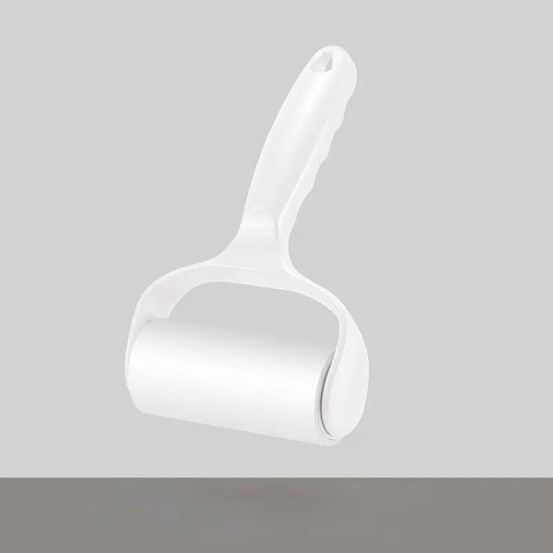 White lint roller for pet hair on a white background.