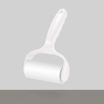 White lint roller for pet hair on a white background.