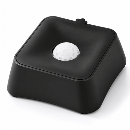 Black liquid slow feeder dog bowl with its lid closed and the rolling ball in the center.
