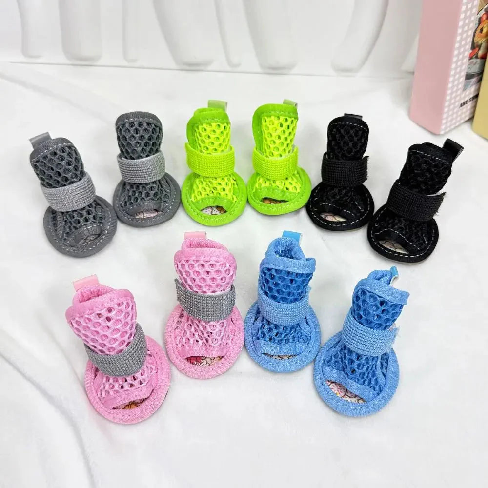 All five colors of the Noblias mesh dog sandals laid out together: gray, green, black, pink and blue.