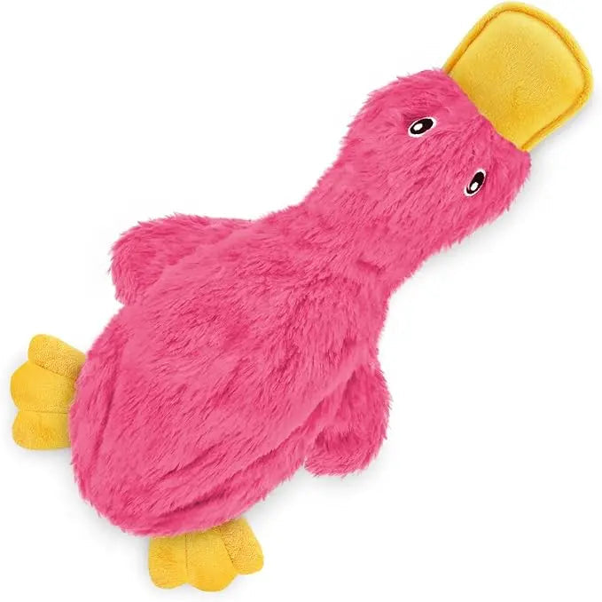 Pink no stuffing duck dog toy with a yellow bill and feet on a white background.
