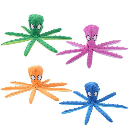 The octopus dog toy shown in green, pink, orange and blue, each with eight flat legs and large printed eyes.