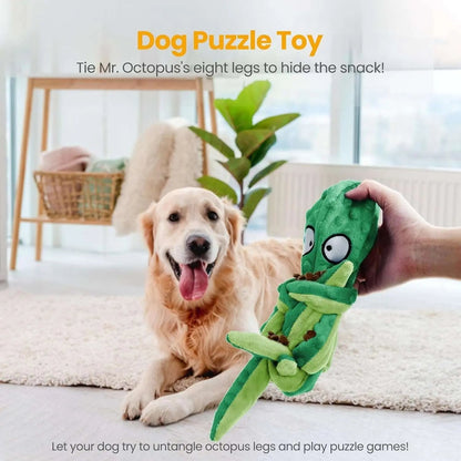 Green octopus dog toy with its legs tied around a treat as a puzzle game, with a golden retriever watching.