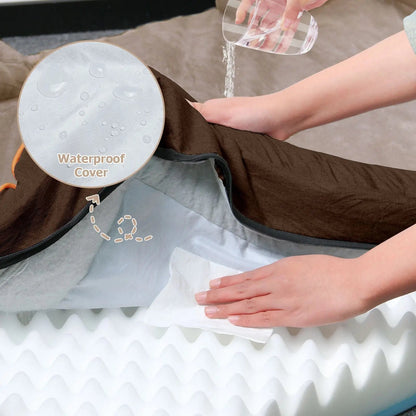 Water being poured onto the brown orthopedic dog bed cover and wiped away, with the foam underneath staying dry.