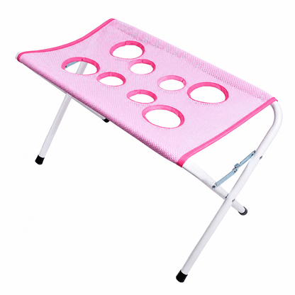 Pink pet grooming hammock stand with a white folding frame and mesh top