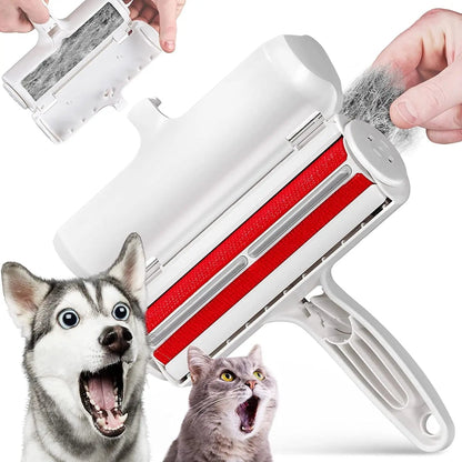 White pet hair remover roller with red bristle strips, its chamber opened to pull out a clump of fur, beside a husky and a cat.
