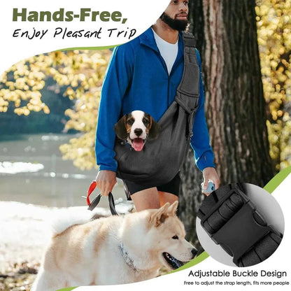 Hands-free banner showing a man walking a large dog on a leash while a small dog rides in the black sling carrier, with a close-up of the adjustable buckle that sets the strap length