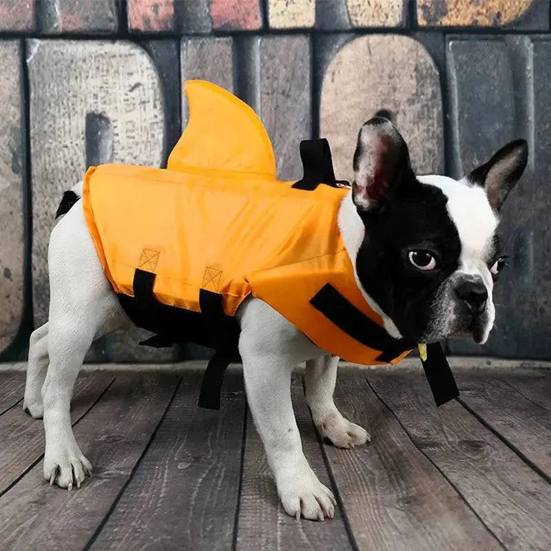 Blue dog swim vest by Noblias featuring a shark design, designed for safe swimming and water safety for pets.