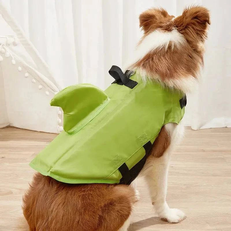 Blue Noblias dog swim vest with shark design, XS size, pet life jacket for safe swimming and water safety.