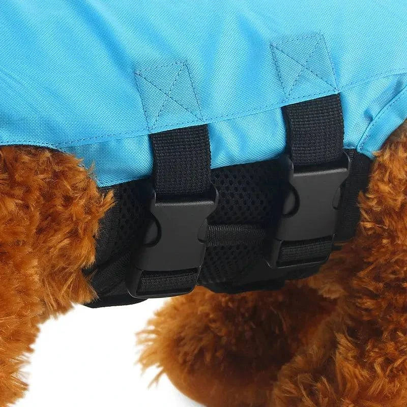 Blue Noblias dog swim vest with shark design, small size, for safe swimming and water safety for pets.