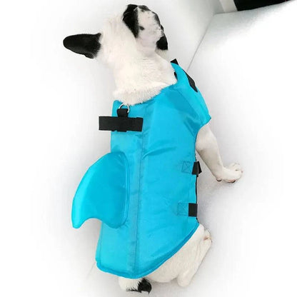 Blue Noblias dog swim vest with shark design, safe pet life jacket for small dogs, enhanced buoyancy and comfort during swimming.