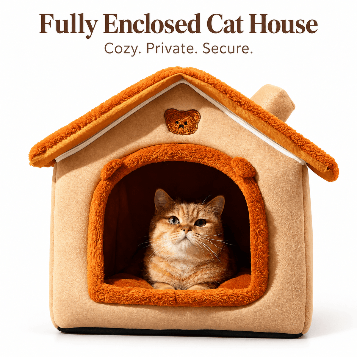 Fully enclosed orange plush cat house bed with a ginger cat sitting inside the arched entrance.