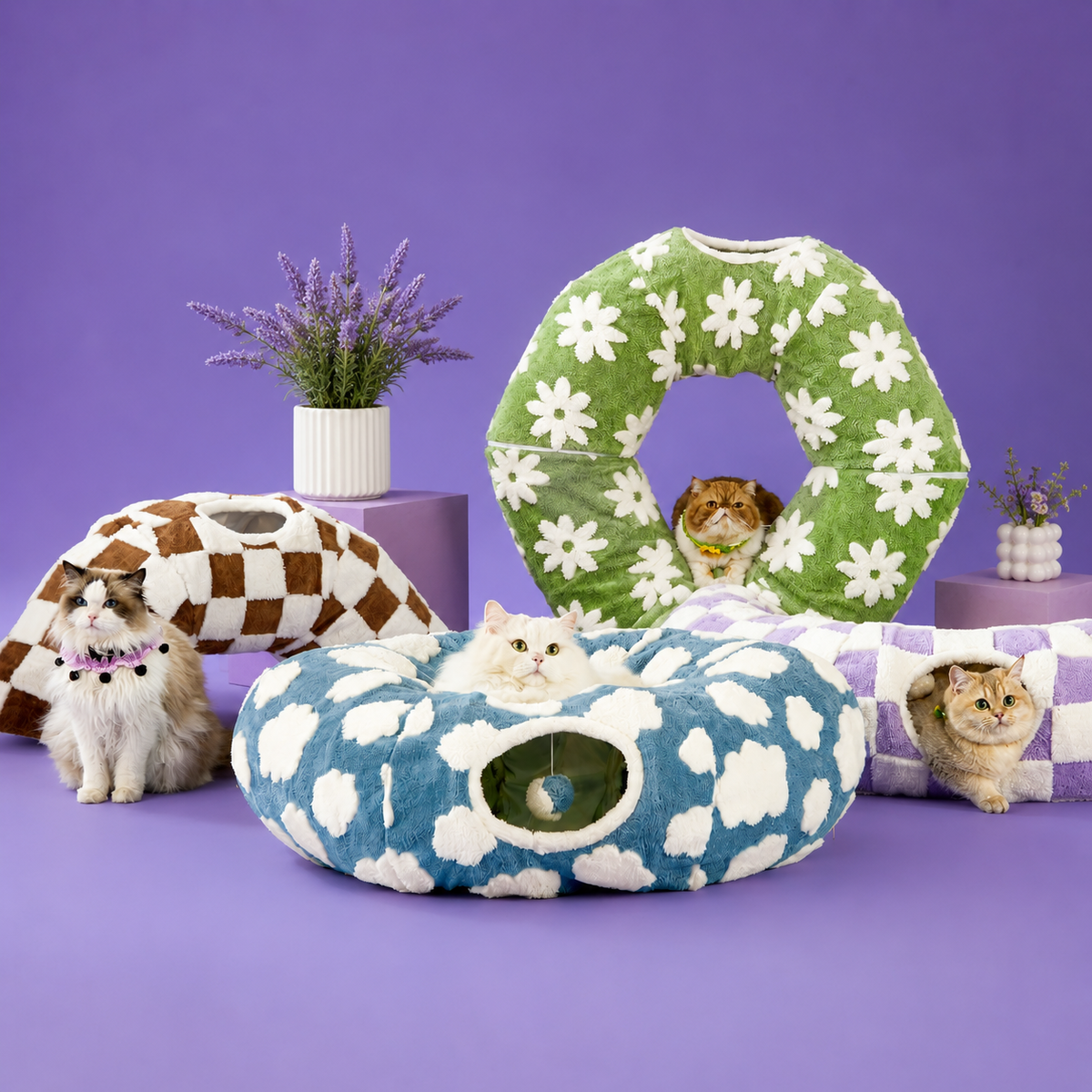 All four plush cat tunnel bed patterns together: blue cloud, purple check, green daisy and coffee check