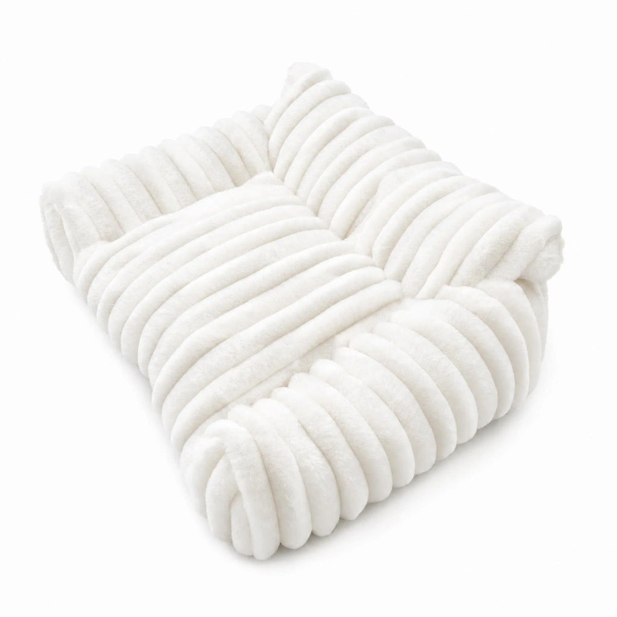 The white ribbed plush sofa bed photographed on its own against a plain background