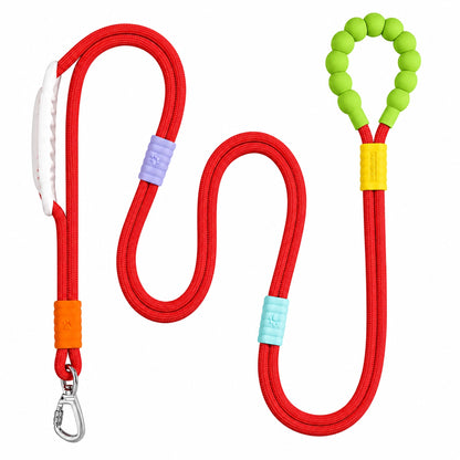 The red Noblias hands free dog leash laid out, showing the silicone beaded loop handle and the metal swivel clip.