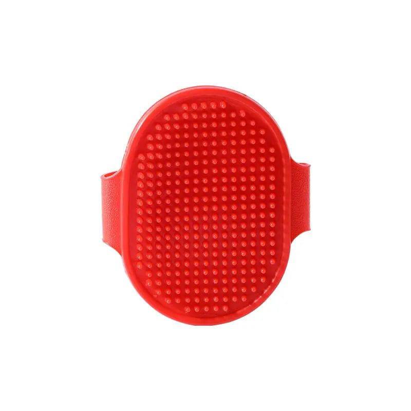 Red oval rubber pet bath brush with its molded hand strap, shown face on against a white background.