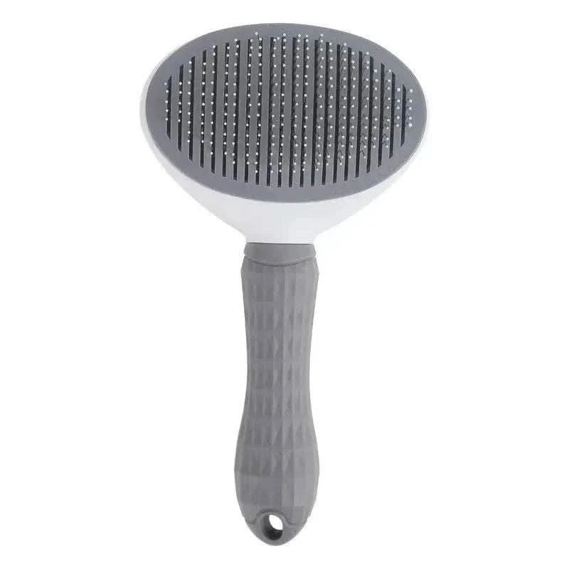 Gray self cleaning slicker brush on a white background.