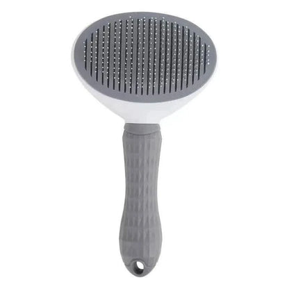 Gray self cleaning slicker brush on a white background.