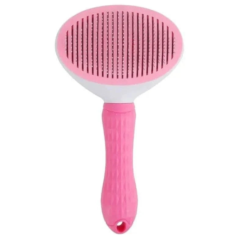Pink self cleaning slicker brush on a white background.