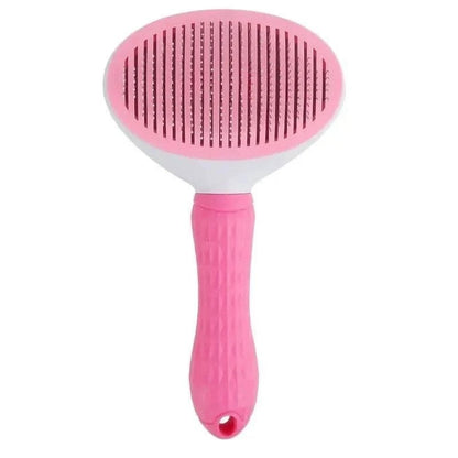 Pink self cleaning slicker brush on a white background.